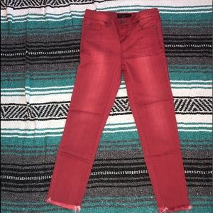 Red low rise skinny jeans